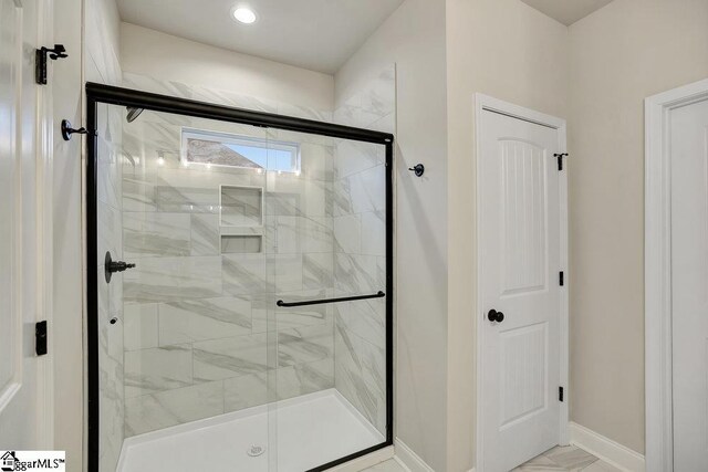 120 Bonaire Pt, Anderson, SC 29621 - full bathroom with a marble finish shower and baseboards