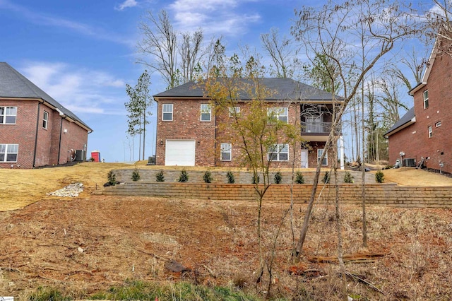 120 Bonaire Pt, Anderson, SC 29621 - rear view of house with a garage, brick siding, and central AC unit