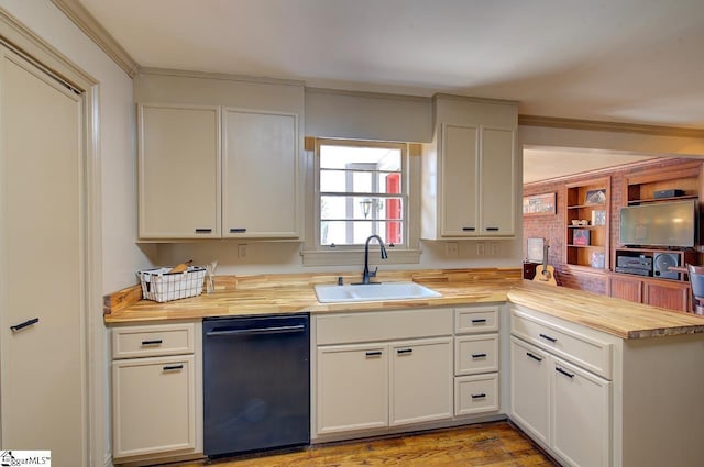 kitchen with crown molding, butcher block counters, a sink, and dishwasher