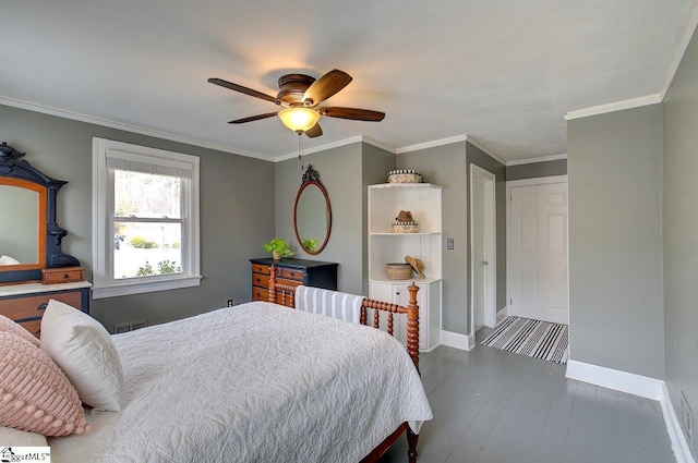 bedroom featuring visible vents, crown molding, baseboards, and dark wood-style flooring