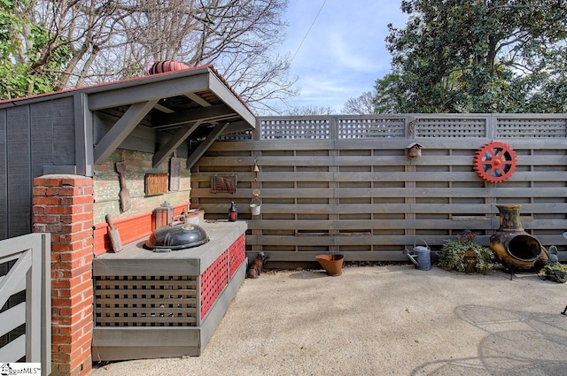 view of patio / terrace with fence