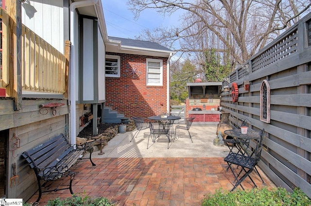 view of patio / terrace with fence and outdoor dining area