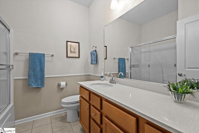 full bathroom with tile patterned flooring, vanity, and toilet