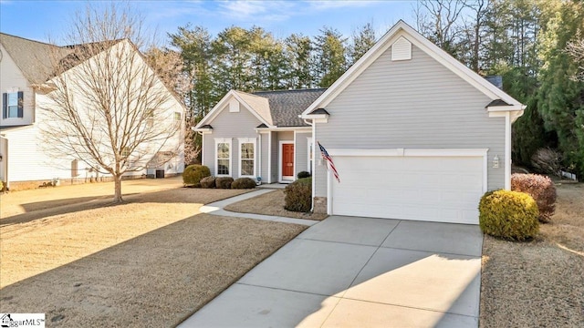 view of front of house featuring concrete driveway