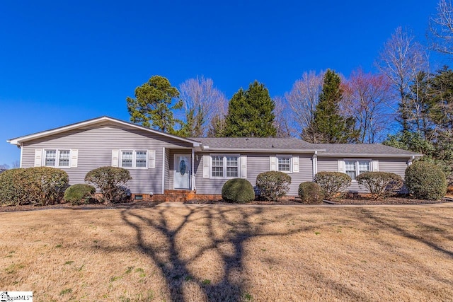 ranch-style home with crawl space, a front lawn, and entry steps