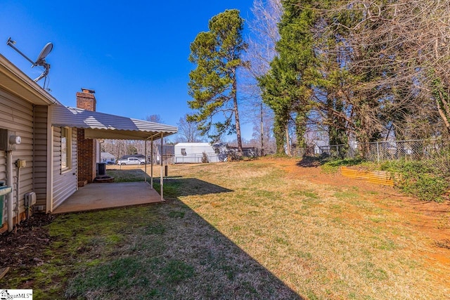 view of yard with a patio area and a fenced backyard