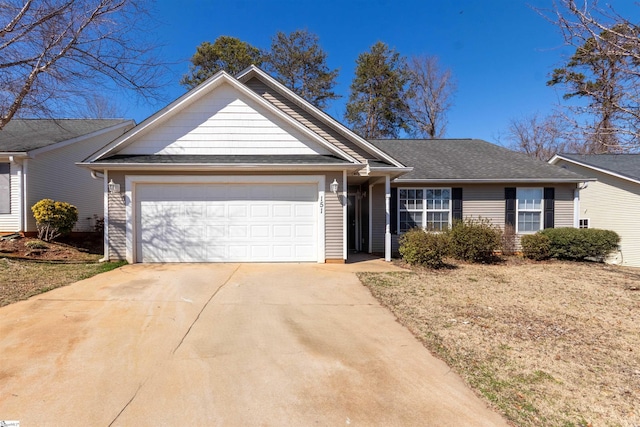 ranch-style home with concrete driveway, roof with shingles, and an attached garage