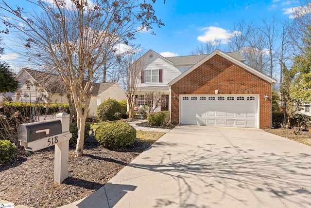 traditional-style home featuring concrete driveway, brick siding, an attached garage, and roof with shingles