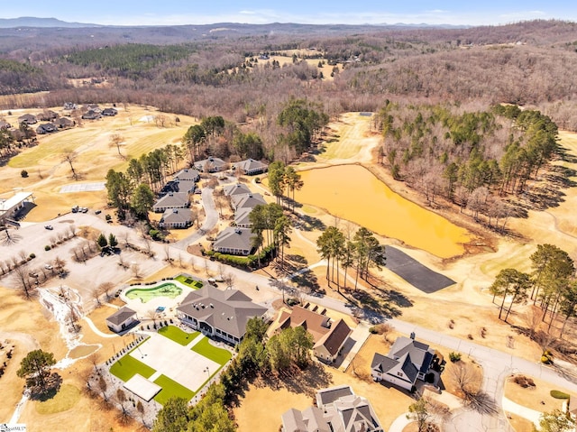 birds eye view of property with a residential view and a water view