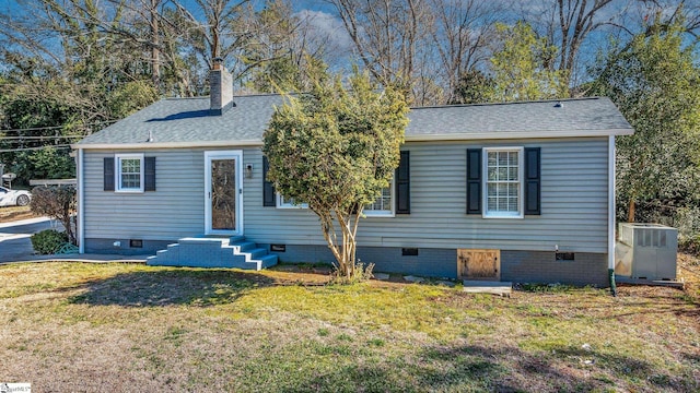 view of front of property featuring central AC unit, a shingled roof, crawl space, a front lawn, and a chimney