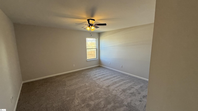 empty room with a ceiling fan, baseboards, and carpet flooring