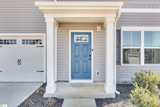 entrance to property with a garage