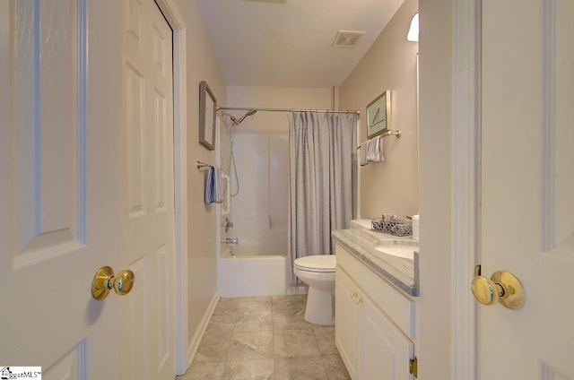 bathroom featuring toilet, visible vents, baseboards, vanity, and shower / tub combo with curtain