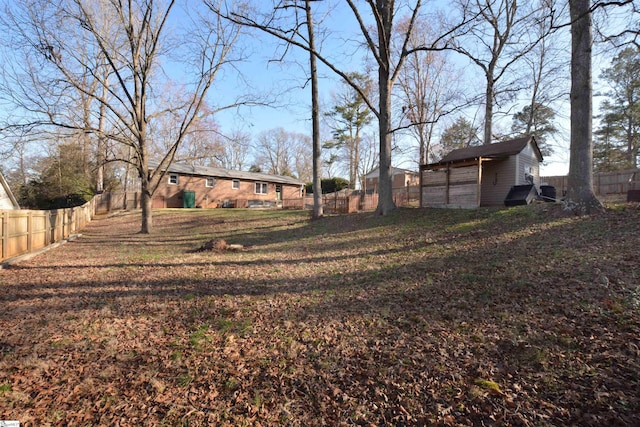 view of yard featuring a fenced backyard