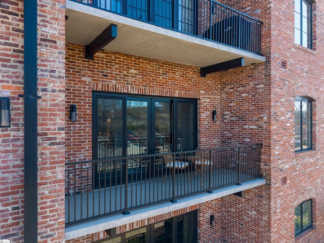 entrance to property with french doors and brick siding