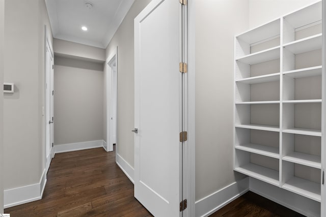 hallway with dark wood-style floors, recessed lighting, and baseboards