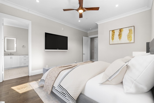 bedroom featuring recessed lighting, crown molding, and wood finished floors