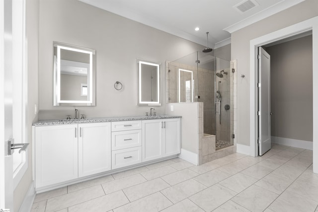 bathroom featuring a sink, visible vents, a shower stall, double vanity, and crown molding