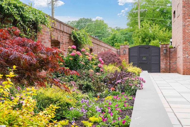 view of gate featuring fence