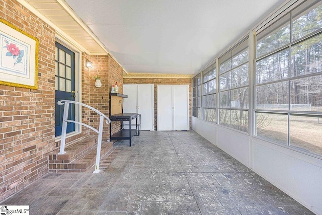 view of unfurnished sunroom