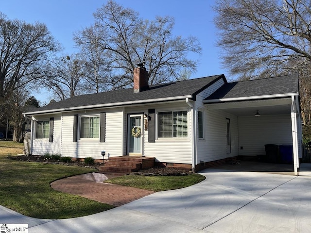 single story home with concrete driveway, a chimney, an attached carport, crawl space, and a front lawn