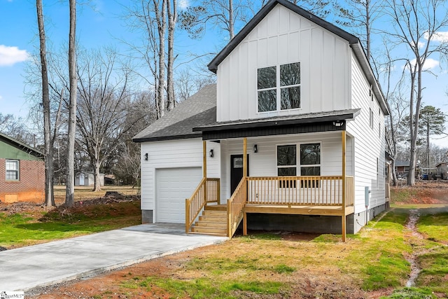 view of front of house with a garage, roof with shingles, covered porch, board and batten siding, and a front yard