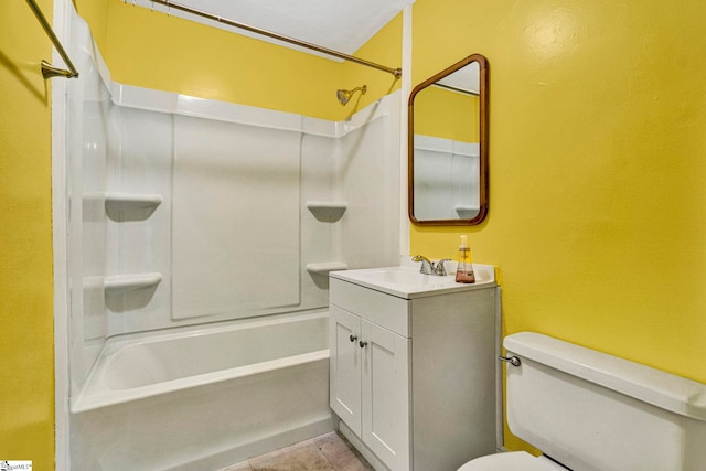 full bath featuring shower / washtub combination, tile patterned flooring, vanity, and toilet