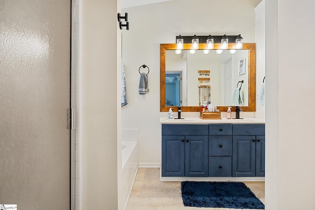 bathroom with double vanity, a shower with shower door, a sink, and a bath