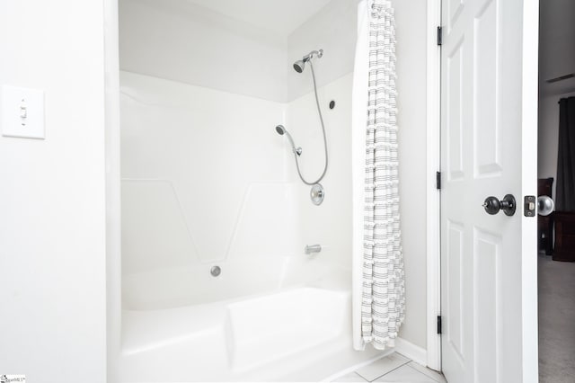 bathroom featuring shower / bathtub combination with curtain