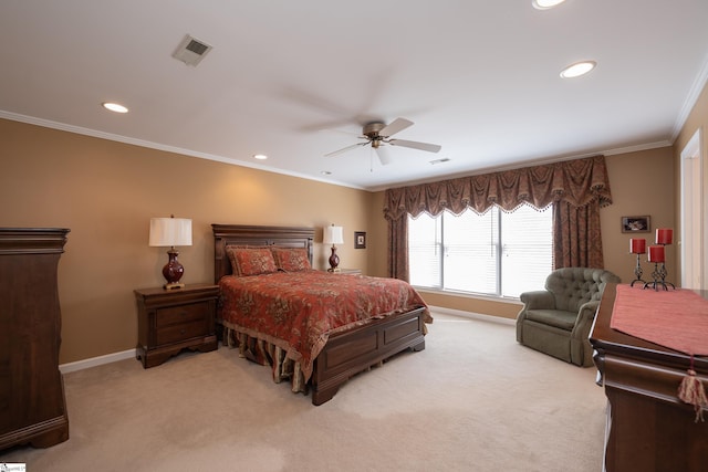 bedroom featuring light colored carpet, crown molding, visible vents, and baseboards