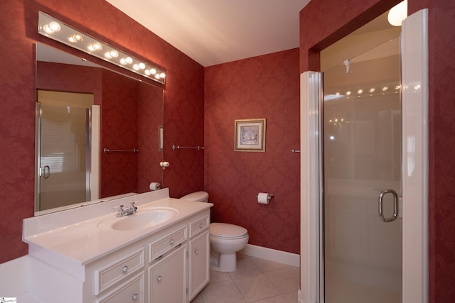 full bathroom featuring wallpapered walls, a stall shower, baseboards, tile patterned floors, and vanity