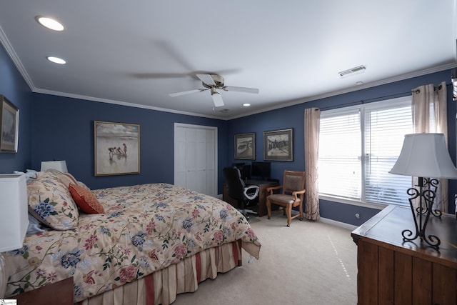 bedroom featuring light carpet, visible vents, baseboards, ornamental molding, and a closet