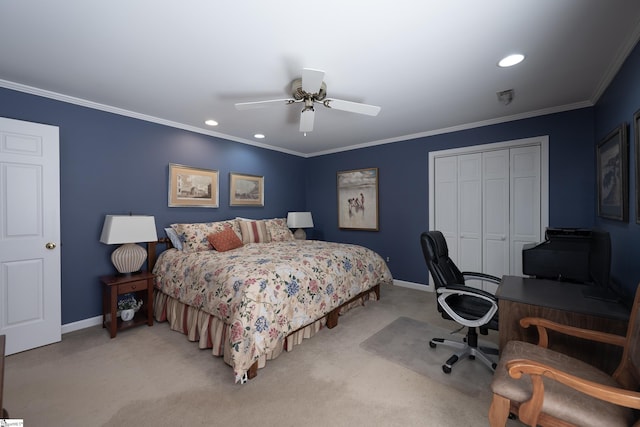 bedroom featuring light carpet, ornamental molding, a closet, and baseboards