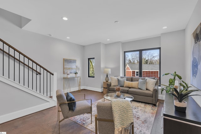 living room featuring baseboards, stairway, dark wood finished floors, and recessed lighting