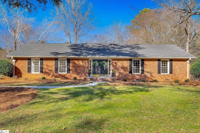 ranch-style home with roof with shingles, brick siding, crawl space, and a front yard