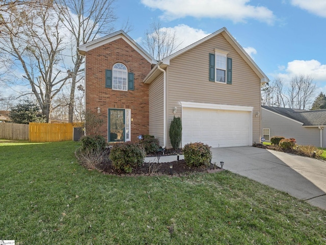 traditional home with a garage, concrete driveway, fence, a front yard, and brick siding