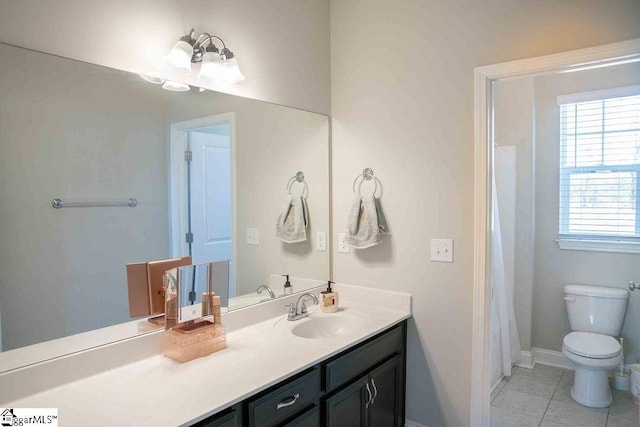 full bath with tile patterned flooring, baseboards, vanity, and toilet