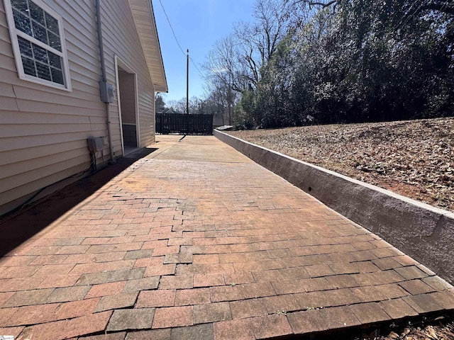 exterior space with a patio area and fence