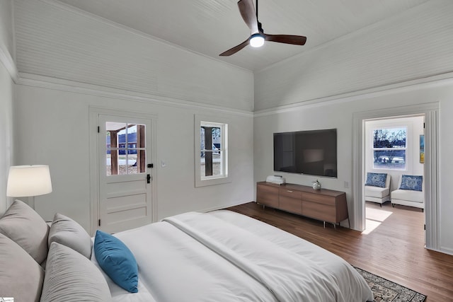 bedroom featuring lofted ceiling, ceiling fan, and wood finished floors