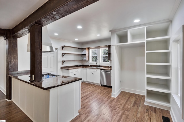 kitchen featuring visible vents, a peninsula, white cabinetry, open shelves, and stainless steel dishwasher