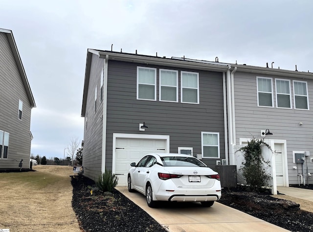 view of front of home with an attached garage and driveway