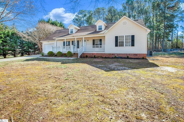 cape cod house featuring a porch, a front lawn, an attached garage, and cooling unit