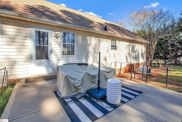 view of patio with fence