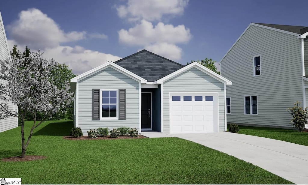 view of front of property with a front yard, concrete driveway, and an attached garage