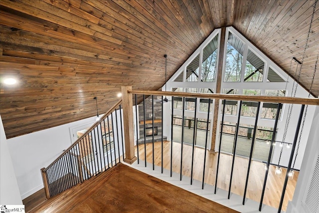 additional living space with wooden ceiling and high vaulted ceiling