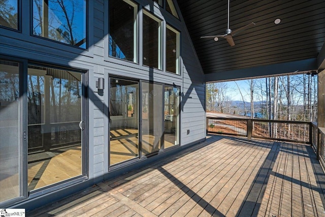 wooden deck with ceiling fan