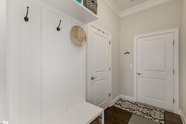 mudroom featuring baseboards, dark wood finished floors, and crown molding