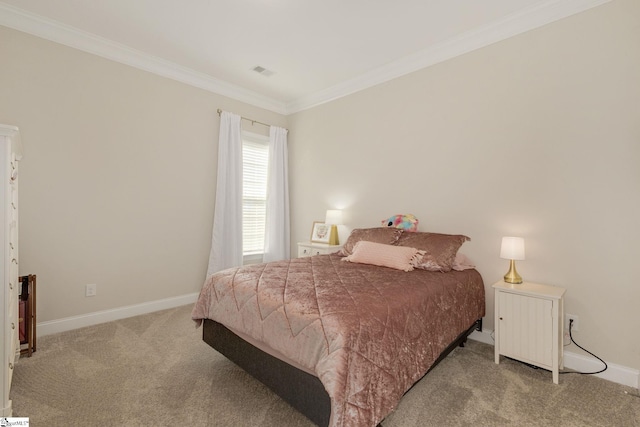 carpeted bedroom with ornamental molding, visible vents, and baseboards