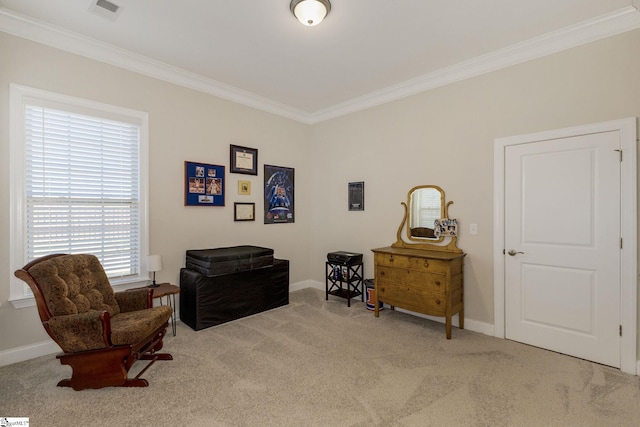 sitting room featuring ornamental molding, carpet, visible vents, and baseboards