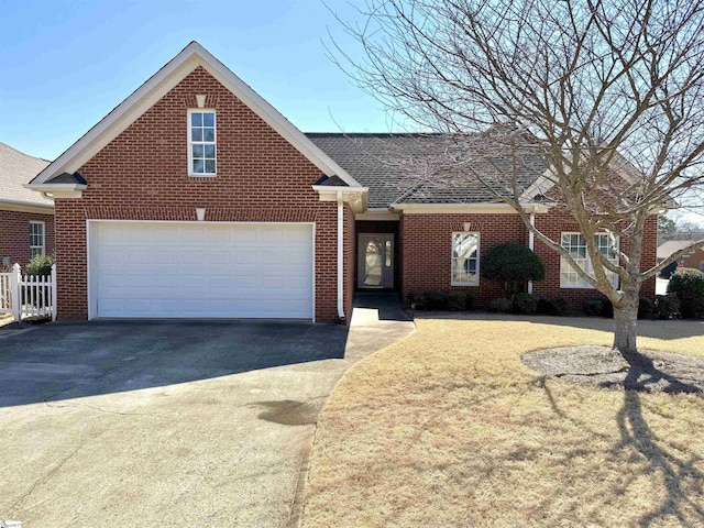 view of front of property featuring aphalt driveway, brick siding, a shingled roof, and a garage